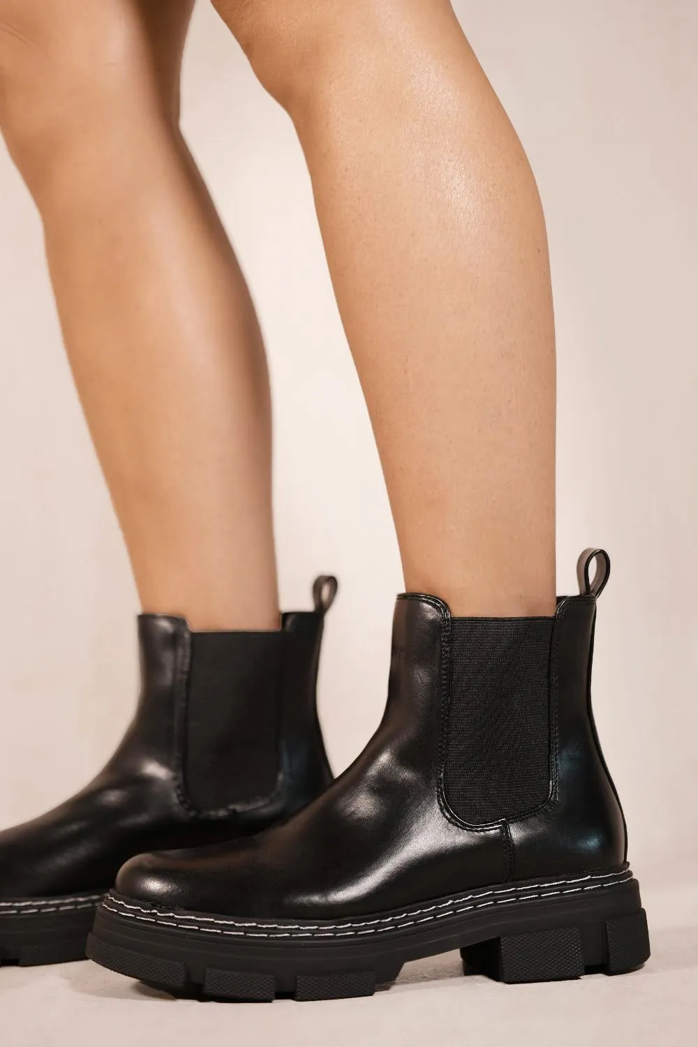 AMIYAH CHUNKY CHEALSEA BOOTS WITH KNITTED SOCK IN BLACK FAUX LEATHER